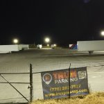 truck parking lot entrance at night
