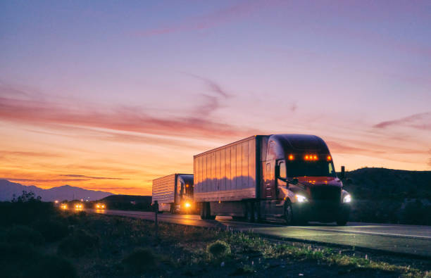 truck driving in sunset photo