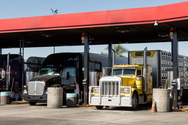 Trucks filling up at truck stop, California, USA
